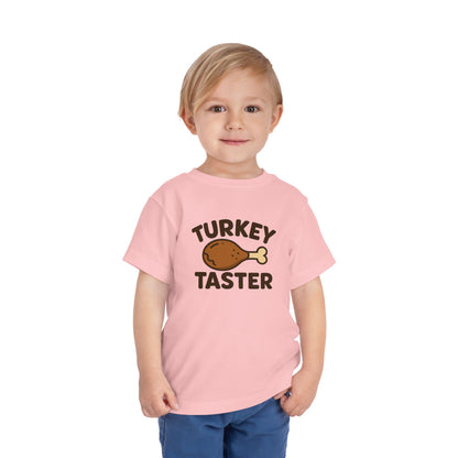 Turkey Taster Toddler Unisex T-Shirt | Fun Holiday Shirt, Thanksgiving Apparel, Gift for Kids, Cute Foodie Outfit