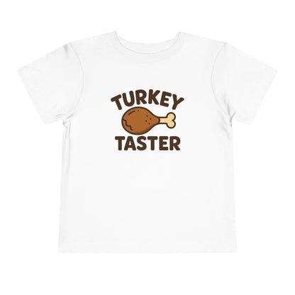 Turkey Taster Toddler Unisex T-Shirt | Fun Holiday Shirt, Thanksgiving Apparel, Gift for Kids, Cute Foodie Outfit