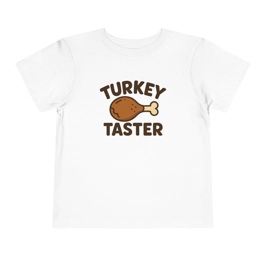 Turkey Taster Toddler Unisex T-Shirt | Fun Holiday Shirt, Thanksgiving Apparel, Gift for Kids, Cute Foodie Outfit