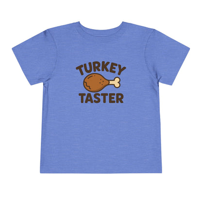 Turkey Taster Toddler Unisex T-Shirt | Fun Holiday Shirt, Thanksgiving Apparel, Gift for Kids, Cute Foodie Outfit
