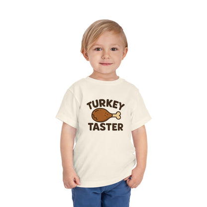 Turkey Taster Toddler Unisex T-Shirt | Fun Holiday Shirt, Thanksgiving Apparel, Gift for Kids, Cute Foodie Outfit