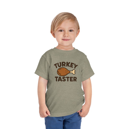 Turkey Taster Toddler Unisex T-Shirt | Fun Holiday Shirt, Thanksgiving Apparel, Gift for Kids, Cute Foodie Outfit