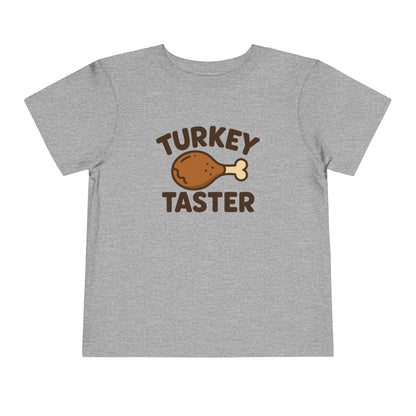 Turkey Taster Toddler Unisex T-Shirt | Fun Holiday Shirt, Thanksgiving Apparel, Gift for Kids, Cute Foodie Outfit