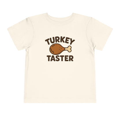 Turkey Taster Toddler Unisex T-Shirt | Fun Holiday Shirt, Thanksgiving Apparel, Gift for Kids, Cute Foodie Outfit