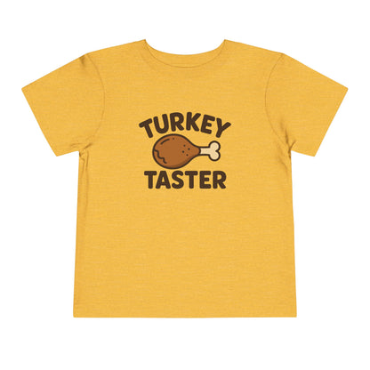 Turkey Taster Toddler Unisex T-Shirt | Fun Holiday Shirt, Thanksgiving Apparel, Gift for Kids, Cute Foodie Outfit