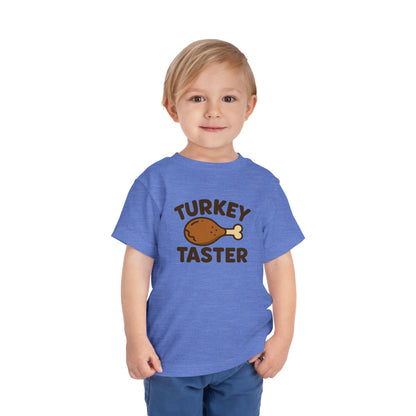 Turkey Taster Toddler Unisex T-Shirt | Fun Holiday Shirt, Thanksgiving Apparel, Gift for Kids, Cute Foodie Outfit