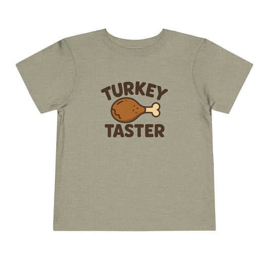 Turkey Taster Toddler Unisex T-Shirt | Fun Holiday Shirt, Thanksgiving Apparel, Gift for Kids, Cute Foodie Outfit